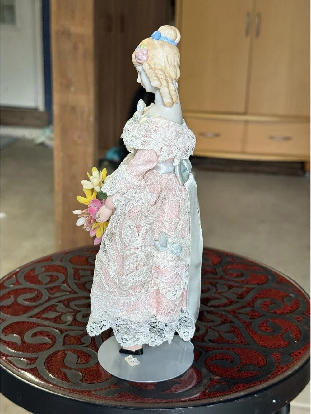 vtg porcelain doll Holding Flowers With Stand